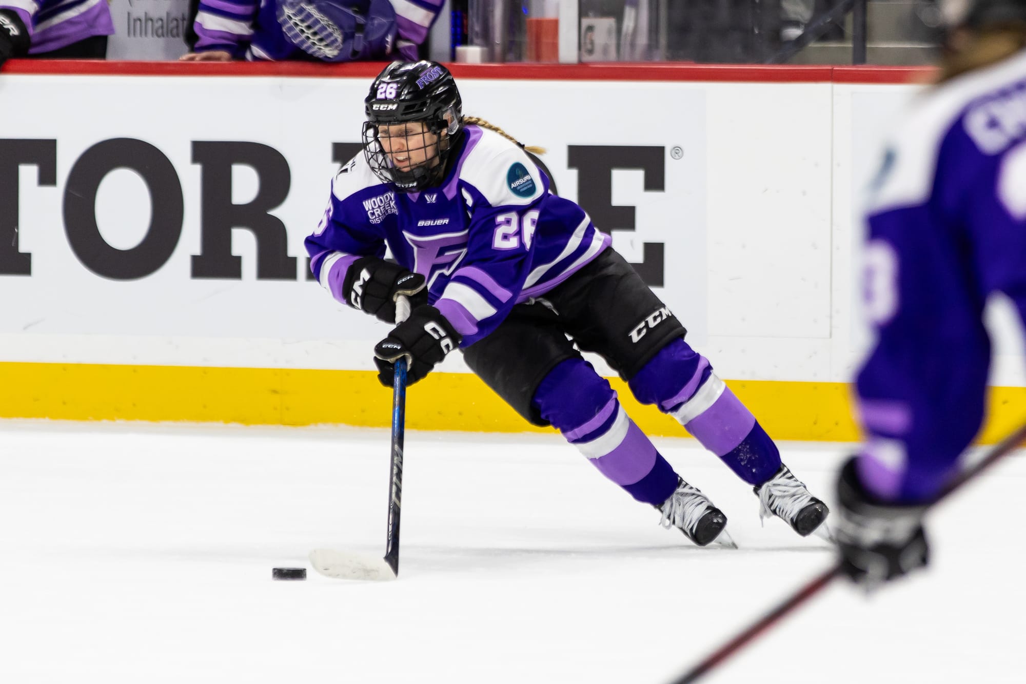 Kendall Coyne Schofield carries the puck