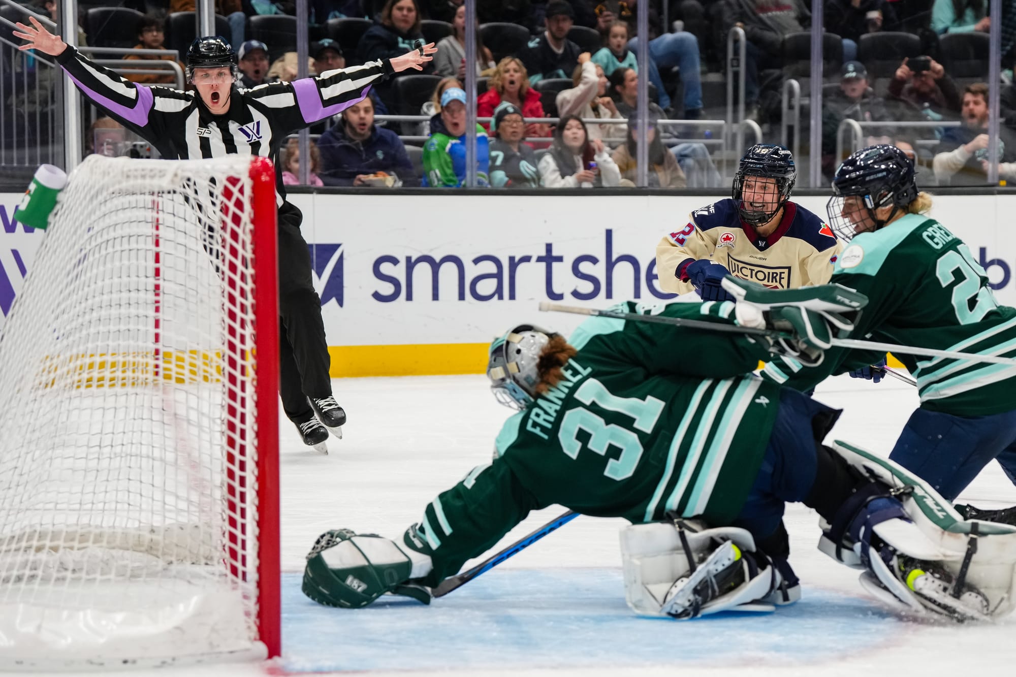 Aerin Frankel reaches for a puck