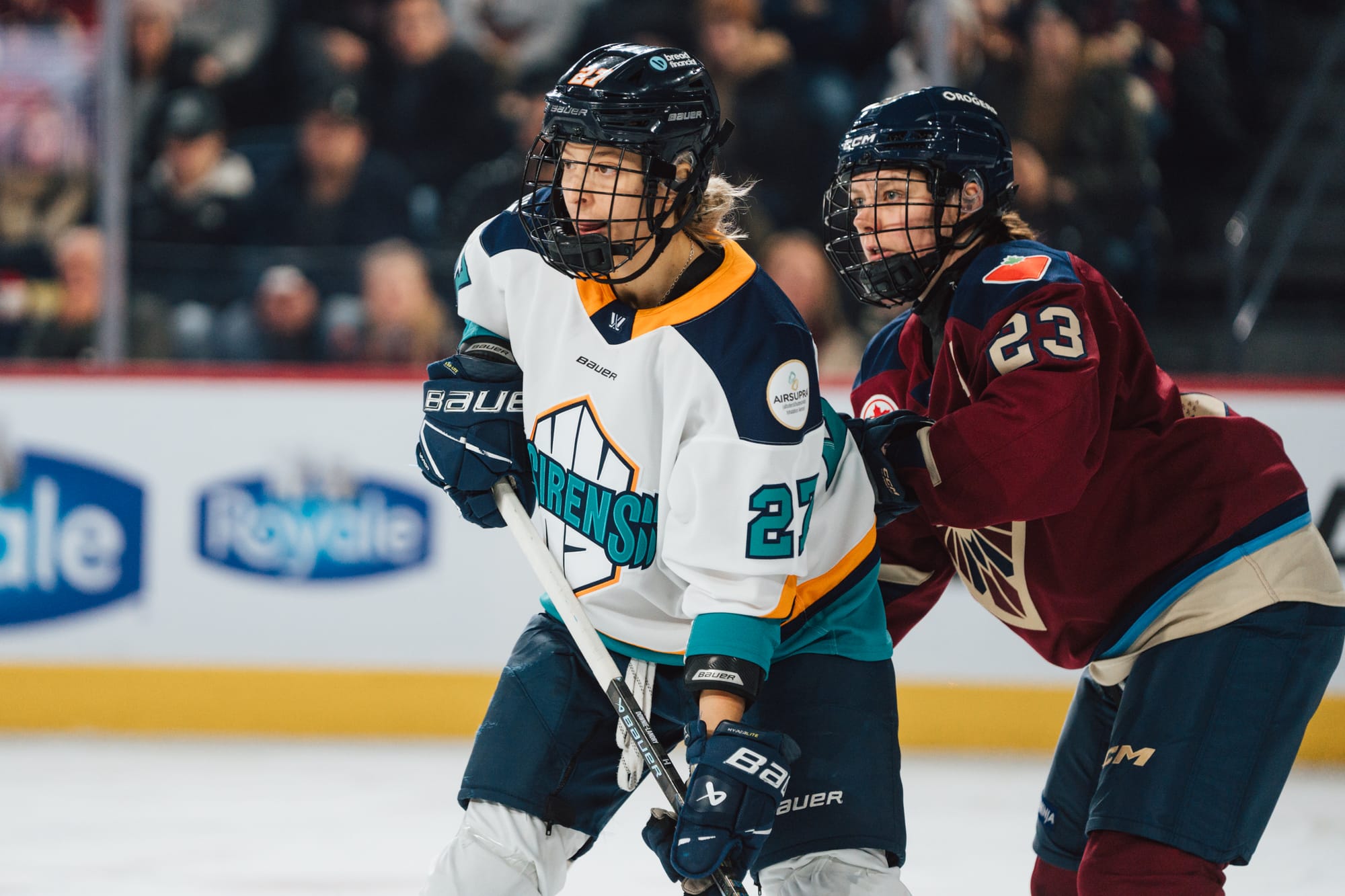 Erin Ambrose battles in front of the net