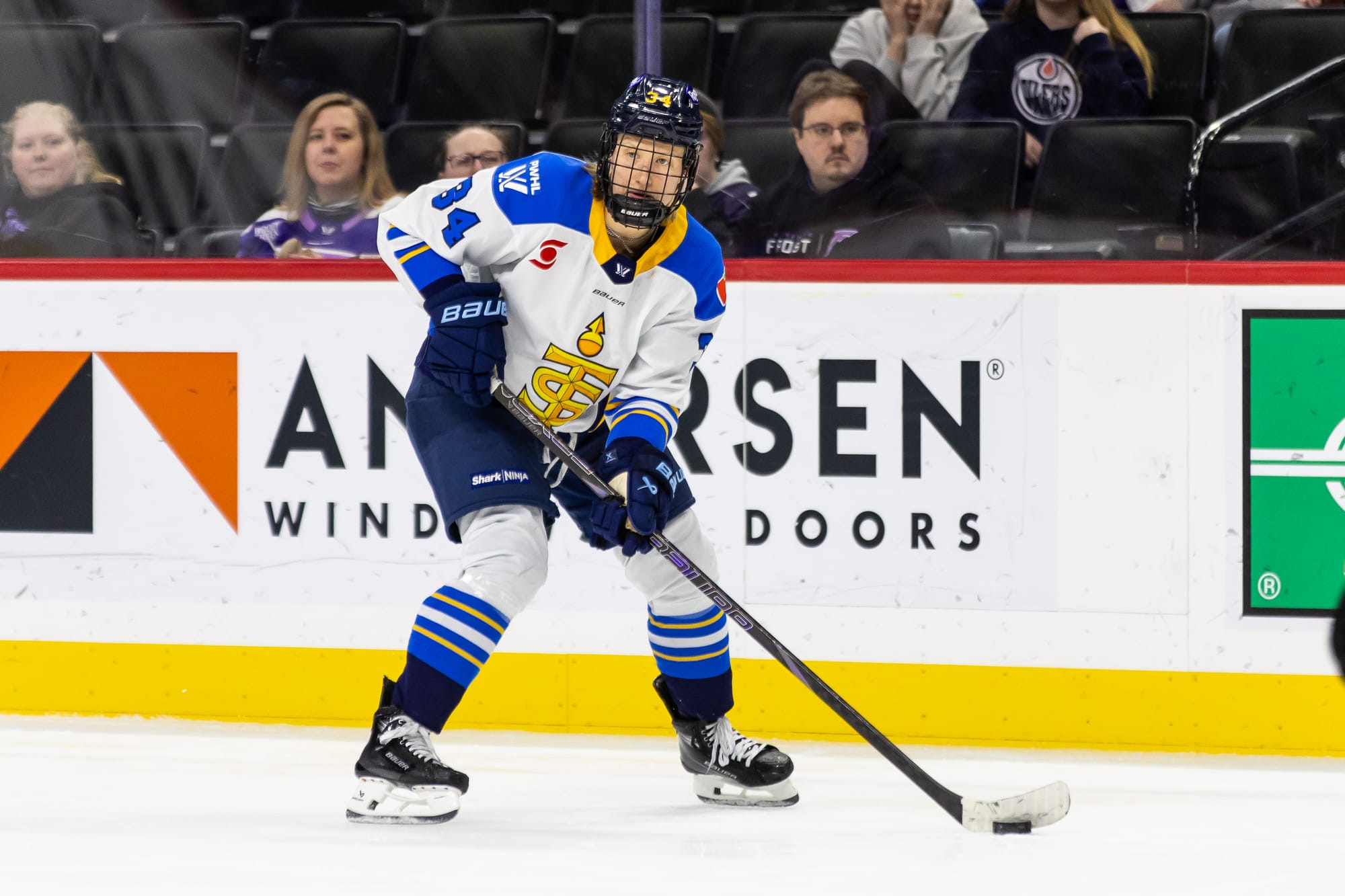 Hannah Miller carries the puck