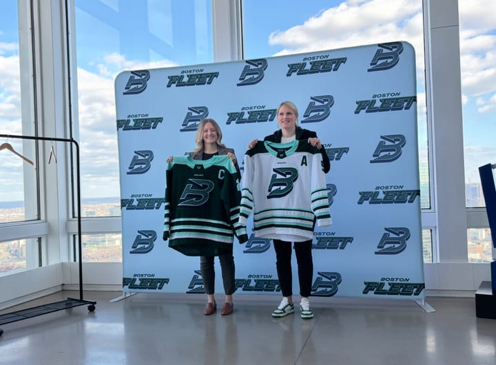 Marmer and Kessel show off the Boston Fleet's new jerseys. Marmer is holding the home one, and Kessel is holding the away.